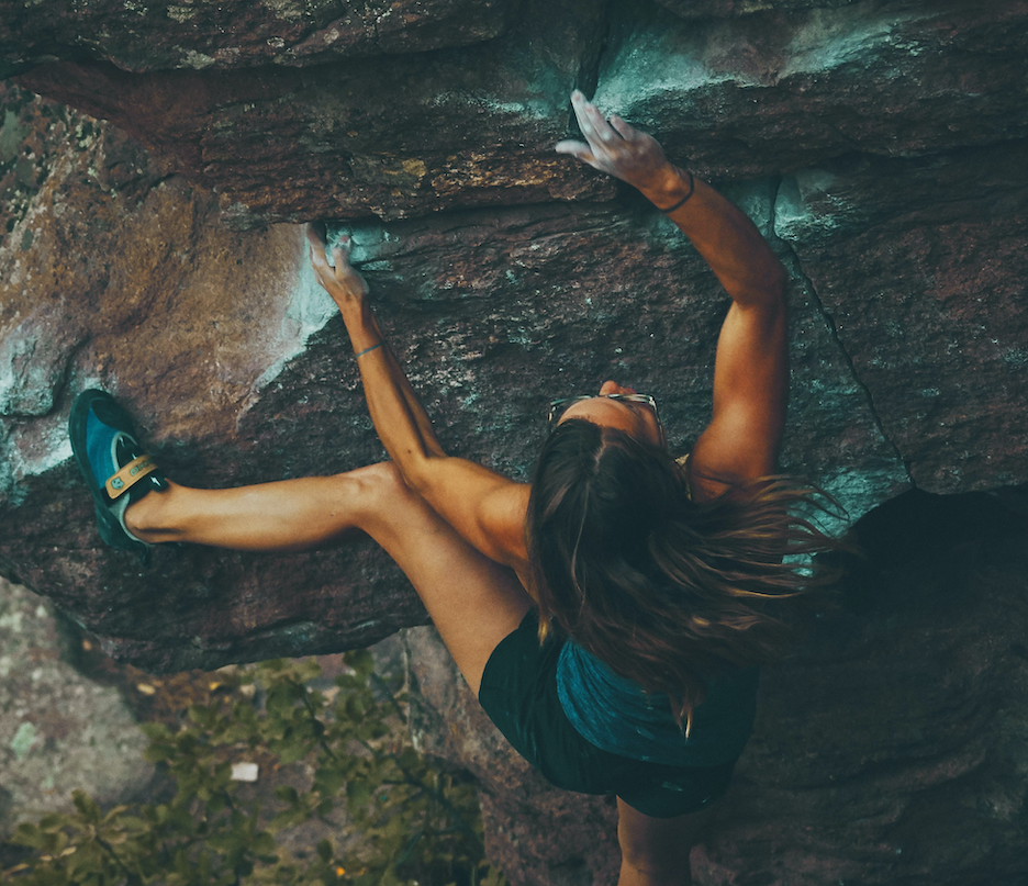 Woman rock climbing